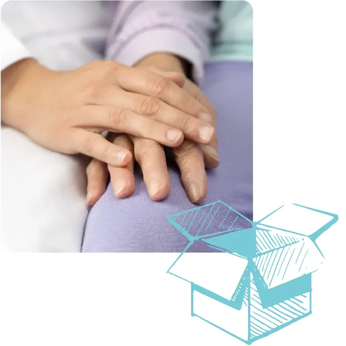 Ältere Person bekommt Hand gehalten
